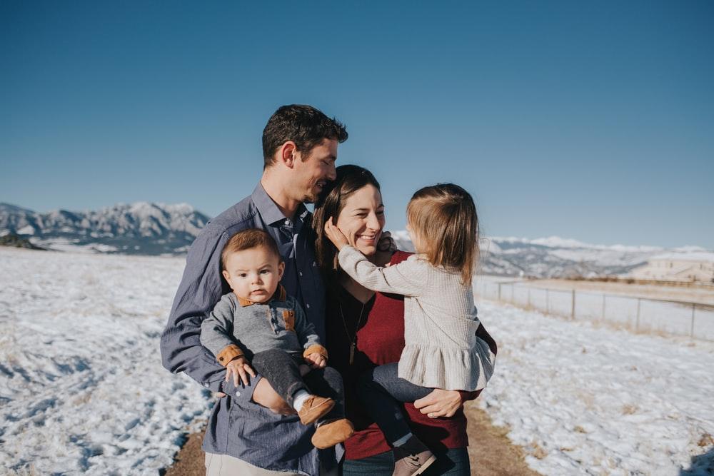 family on snow field